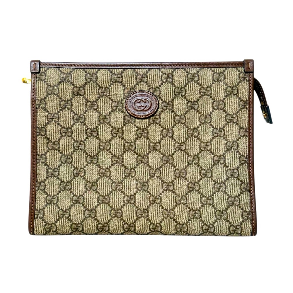 GUCCI GG SUPREME MONOGRAM CLUTCH.